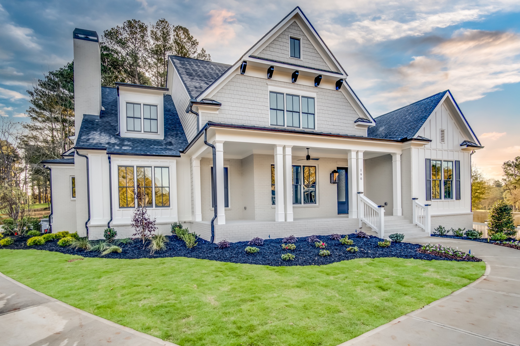 White custom home with a welcoming front porch in North Georgia